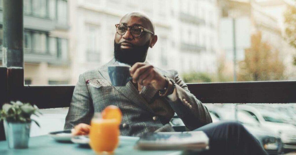 a man reviewing his tax efficient investments in a cafe